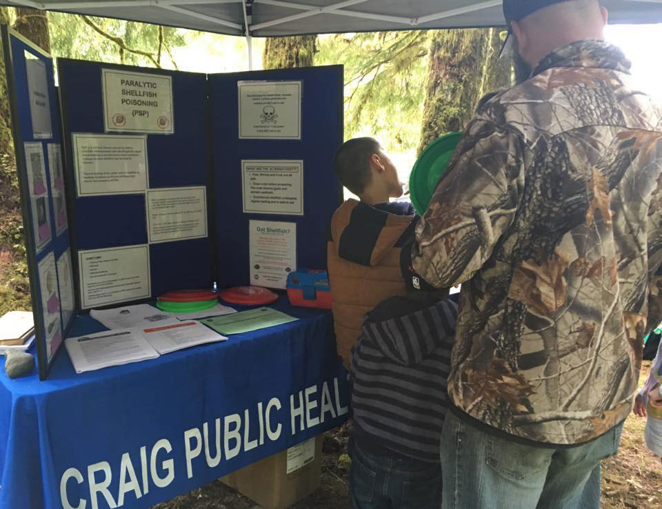 Craig Public Health outreach booth sharing paralytic shellfish poisoning safety information